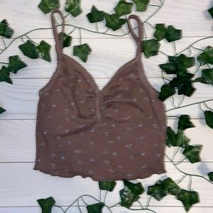 pretty little blue flowers on this brown crop top